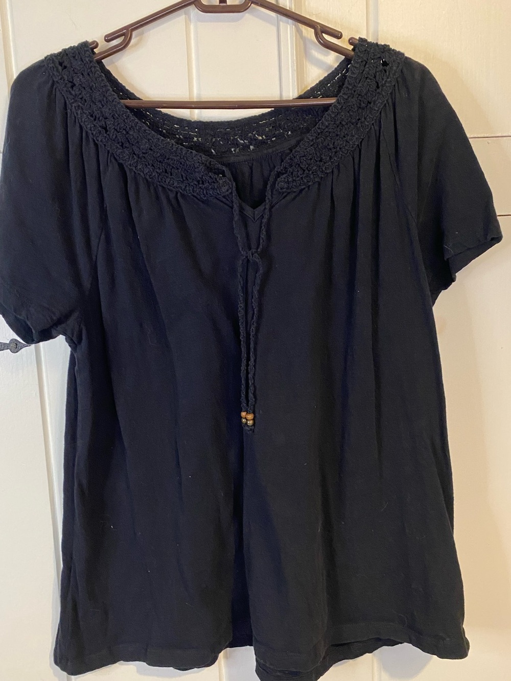 Laura Scott black boho-style peasant top with a crochet-trimmed neckline. XL